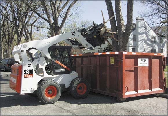 Bobcat Loading Dumpster